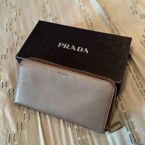 Prada wallet, oversized.